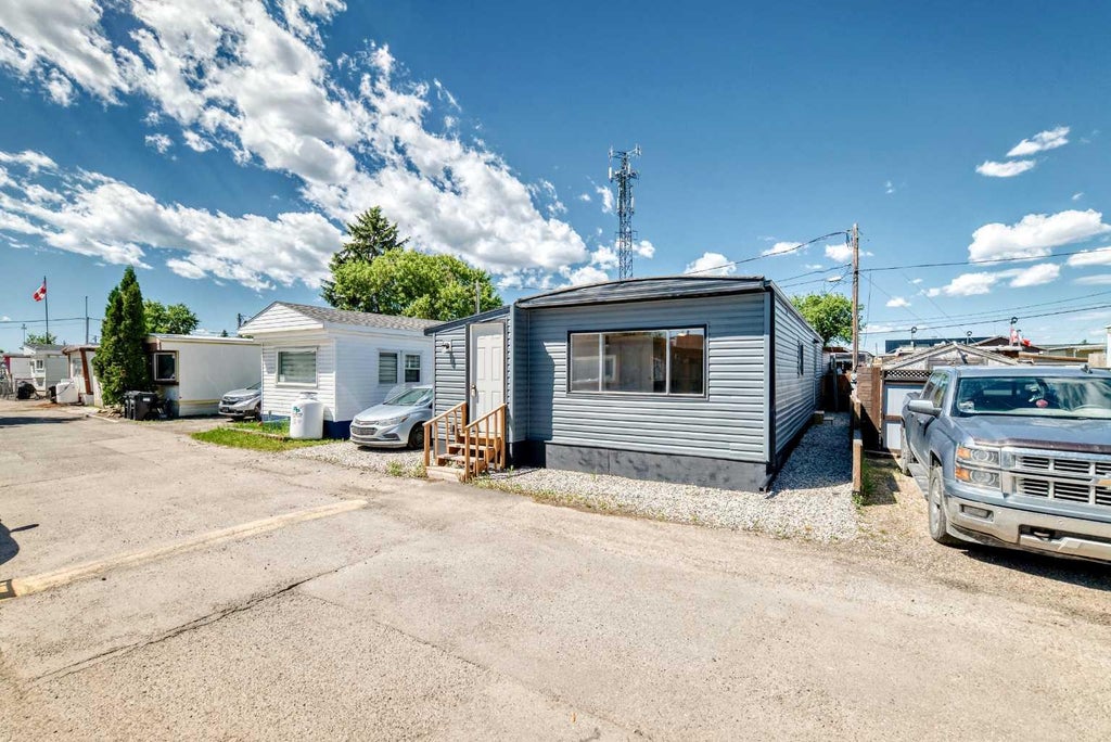 Photo of 2106 50 Street SE #30, Calgary, AB T2B 1M7 (MLS # A2327664)