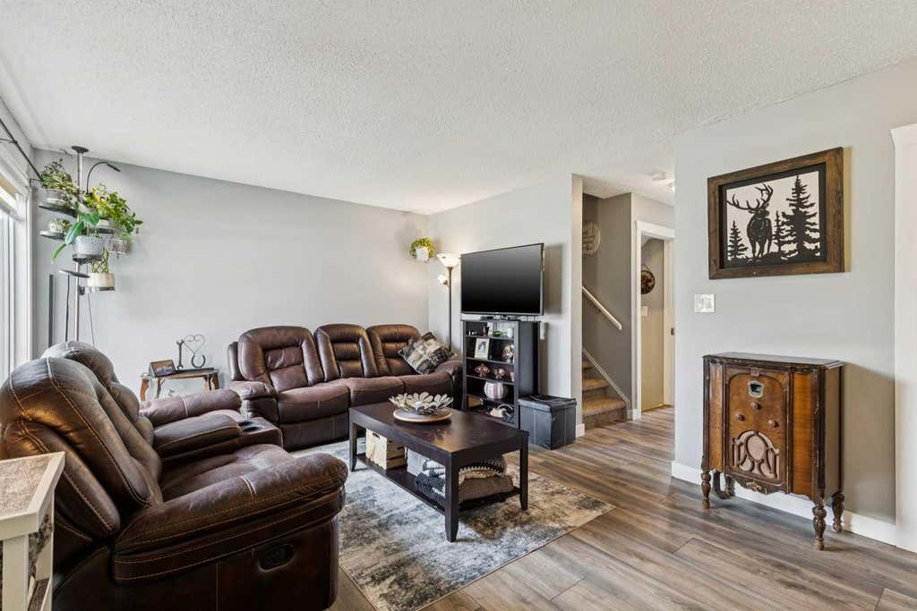 Photo of 107 Elm Place #113, Okotoks, AB T1S 1J1 (MLS # A2327584)