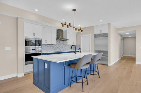 Photo of 15 Cougar Ridge Landing SW #409, Calgary, AB T3H 6C3 (MLS # A2302577)