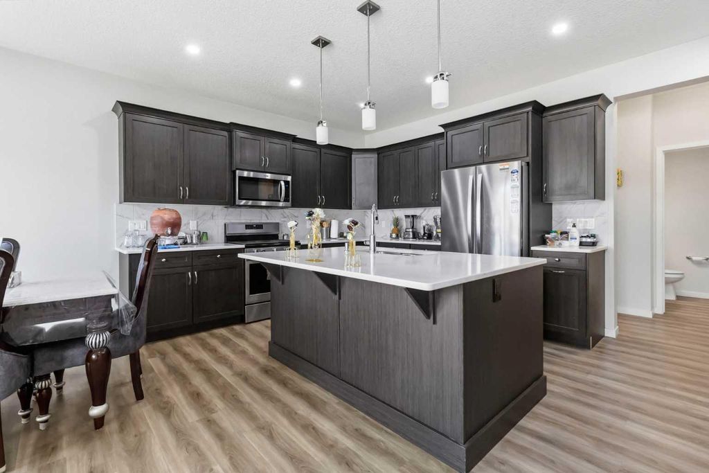 Photo of 62 Wolf Hollow Way SE, Calgary, AB T2X 1T8 (MLS # A2329556)