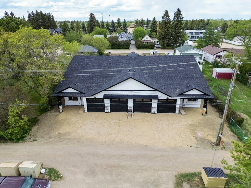 Photo of 5463 55 Avenue #8, Lacombe, AB T4L 1M1 (MLS # A2353591)