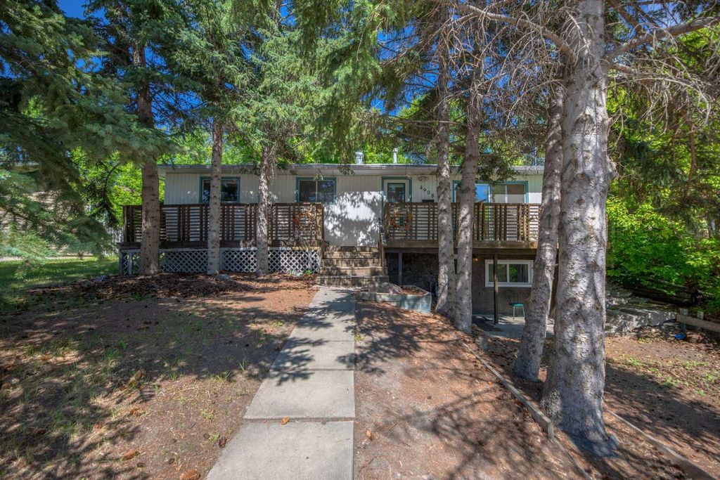 Photo of 4908 23 Avenue NW, Calgary, AB T3B 0Z7 (MLS # A2282875)