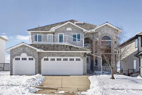Photo of 359 Rocky Ridge Drive NW, Calgary, AB T3G 4X3 (MLS # A2303717)