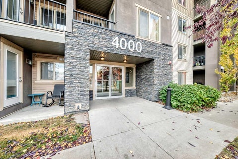 Photo of 403 Mackenzie Way SW #4118, Airdrie, AB T4B 3V7 (MLS # A2353070)