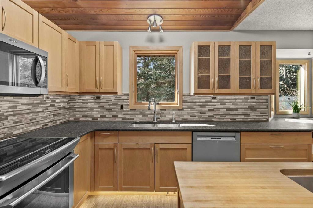 Photo of 244 Ranchridge Bay NW, Calgary, AB T3G 1V4 (MLS # A2296107)