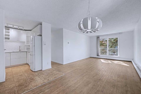 Photo of 5601 Dalton Drive NW #402C, Calgary, AB T3A 2E2 (MLS # A2352008)