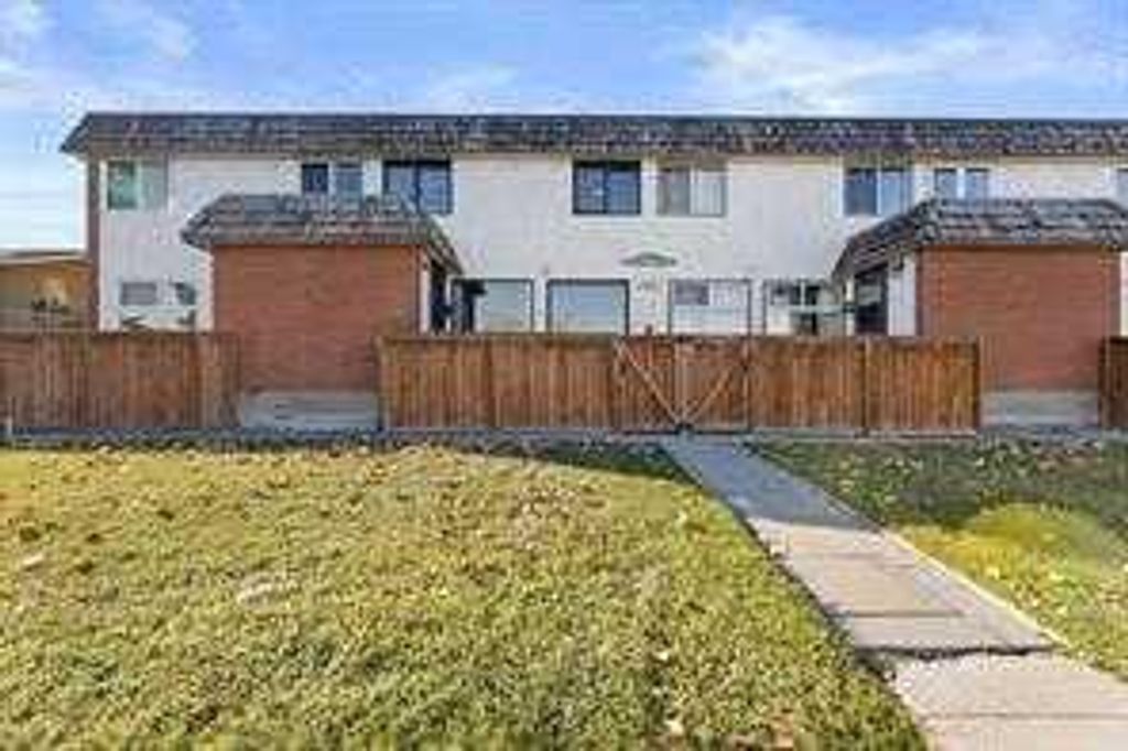 Photo of 6147 Buckthorn Road NW #2, Calgary, AB T2K 2Z2 (MLS # A2301148)