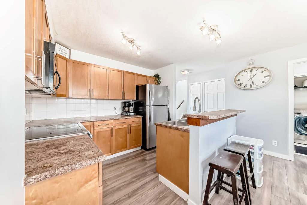 Photo of 1552 Mcalpine Street, Carstairs, AB T0M 0N0 (MLS # A2318870)