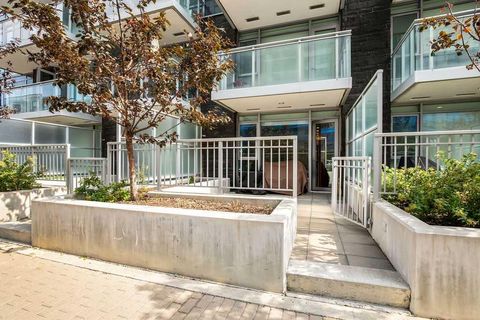 Photo of 108 Waterfront Court SW #103, Calgary, AB T2P 1K7 (MLS # A2267231)