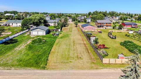 Photo of 255 N 300 W, Raymond, AB T0K 2S0 (MLS # A2326940)