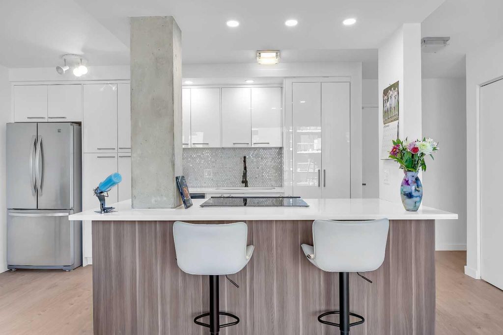 Photo of 1111 15 Avenue SW #701, Calgary, AB T2R 0S8 (MLS # A2285442)