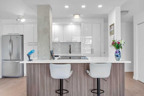 Photo of 1111 15 Avenue SW #701, Calgary, AB T2R 0S8 (MLS # A2285442)