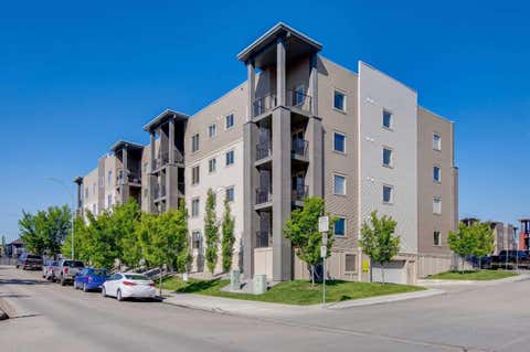 Photo of 403 Mackenzie Way SW #3407, Airdrie, AB T4B 3V7 (MLS # A2336048)