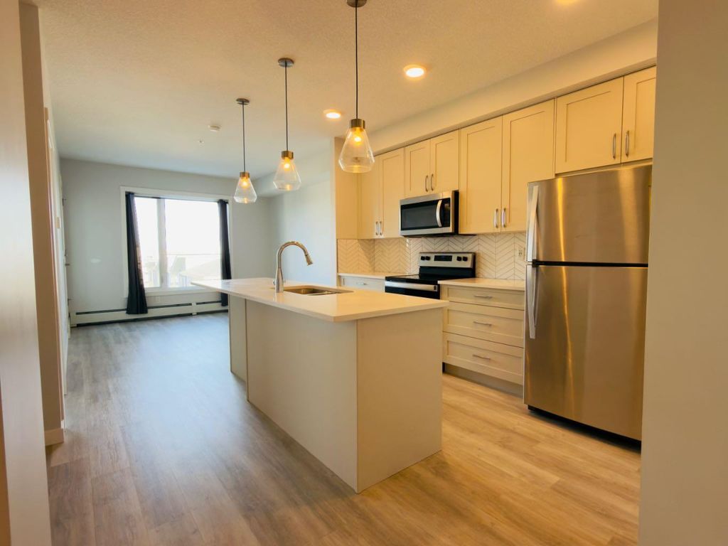 Photo of 200 Shawnee Square SW #404, Calgary, AB T2T 0T7 (MLS # A2283795)