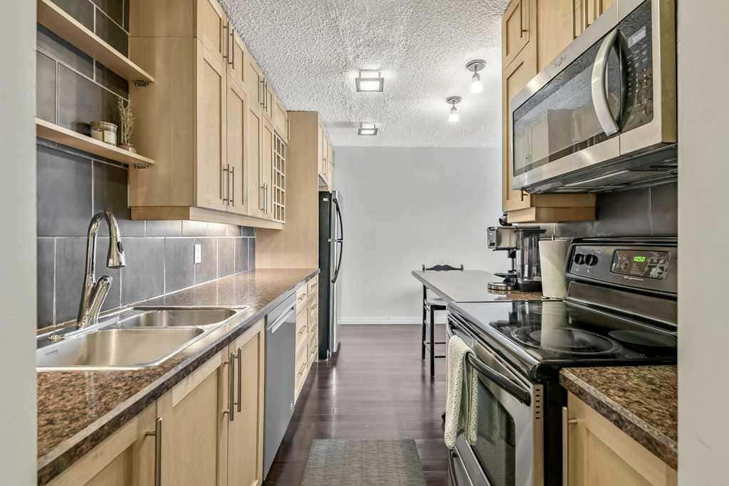 Photo of 2140 17A Street SW #402, Calgary, AB T2T 4R8 (MLS # A2334285)