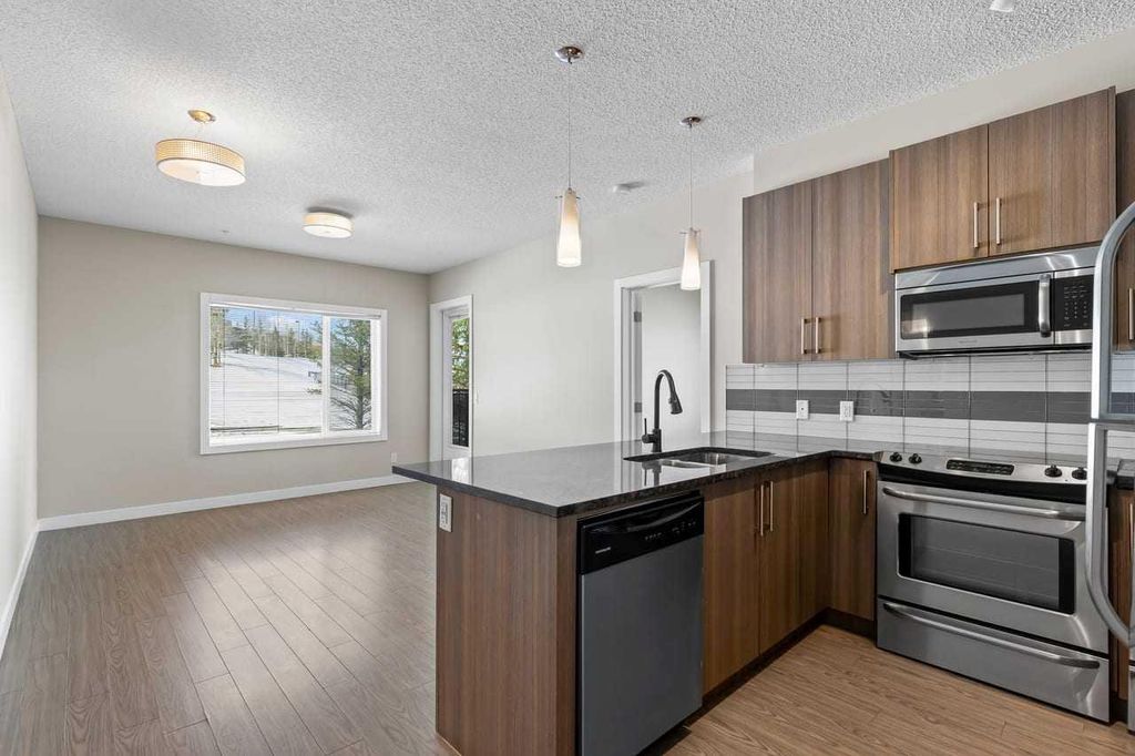Photo of 8 Sage Hill Terrace NW #101, Calgary, AB T3R 0W5 (MLS # A2299456)
