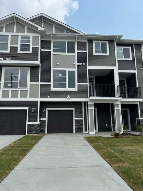 Photo of 8 Waterford Glen, Chestermere, AB T1X 2T8 (MLS # A2337859)