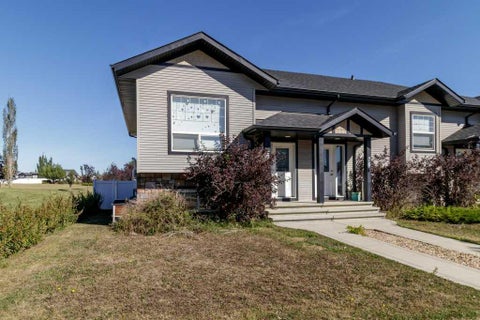 Photo of 74 Hawkridge Boulevard, Penhold, AB T0M 1R0 (MLS # A2342067)
