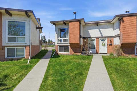 Photo of 416 Pinemont Gate NE, Calgary, AB T1Y 2R6 (MLS # A2310911)
