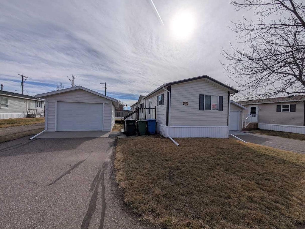 Photo of 211 Railway Avenue, Coaldale, AB T1M 0A8 (MLS # A2339336)