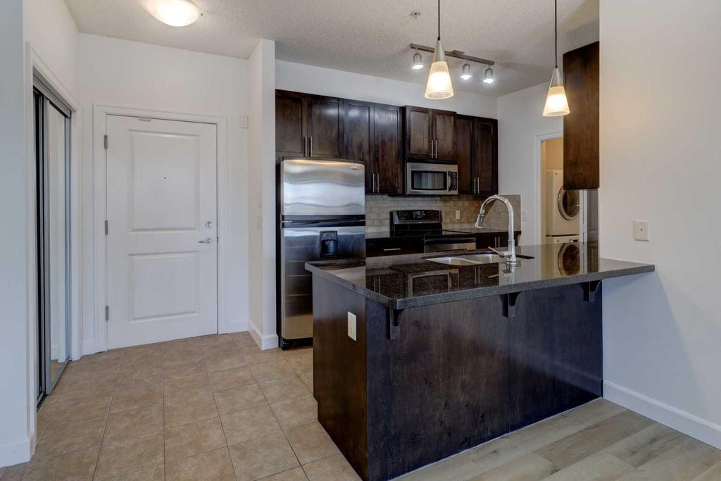 Photo of 88 Arbour Lake Road NW #103, Calgary, AB T3G 0C2 (MLS # A2300747)