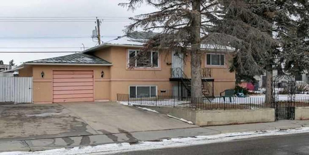 Photo of 4010 8 Avenue SW, Calgary, AB T3C 0G3 (MLS # A2224122)