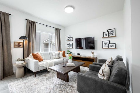 Photo of 304 Heritage Boulevard, Cochrane, AB T4C 3K6 (MLS # A2348957)