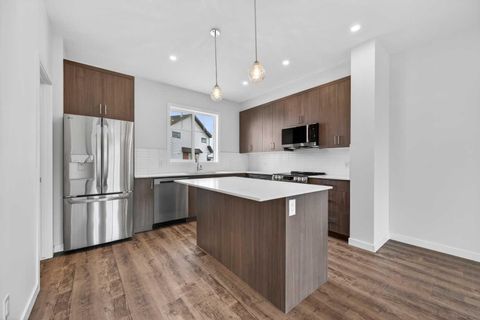Photo of 28 Red Embers Plaza NE #203, Calgary, AB T3N 2W1 (MLS # A2322329)
