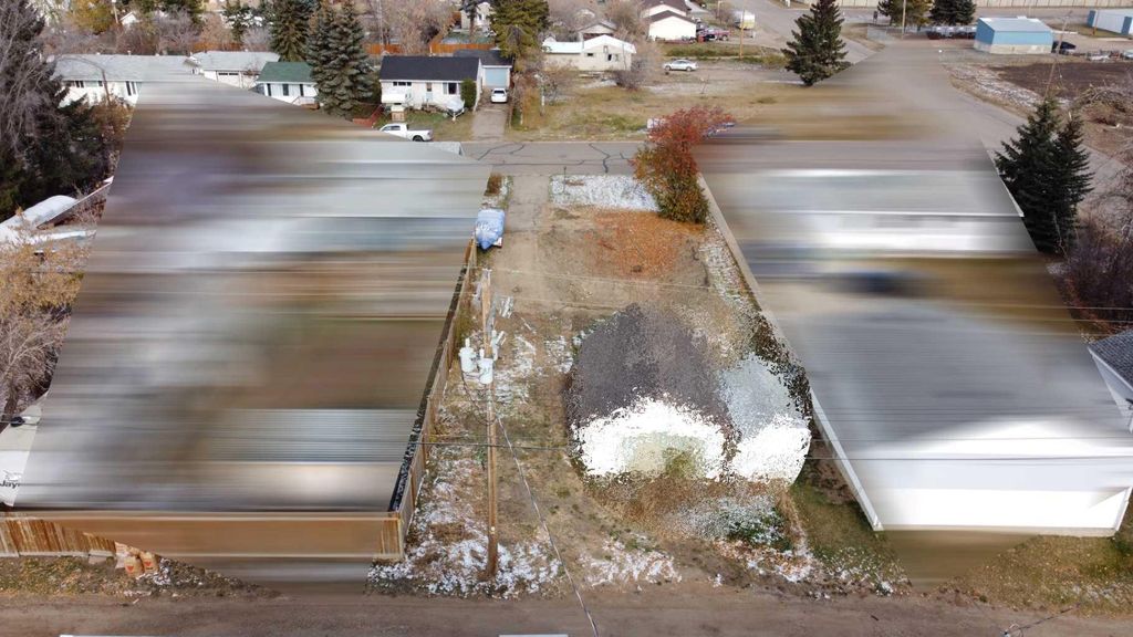 Photo of 1041 15 Avenue, Wainwright, AB T9W 1J8 (MLS # A2089854)