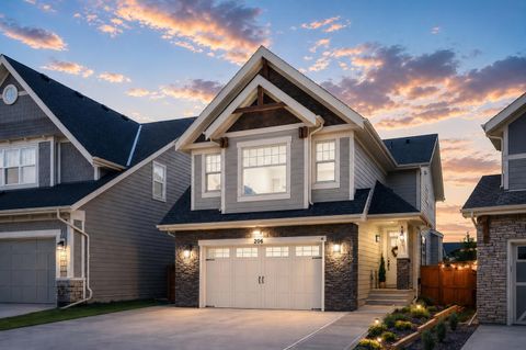 Photo of 206 Riviera View, Cochrane, AB T4C 0Z1 (MLS # A2301191)
