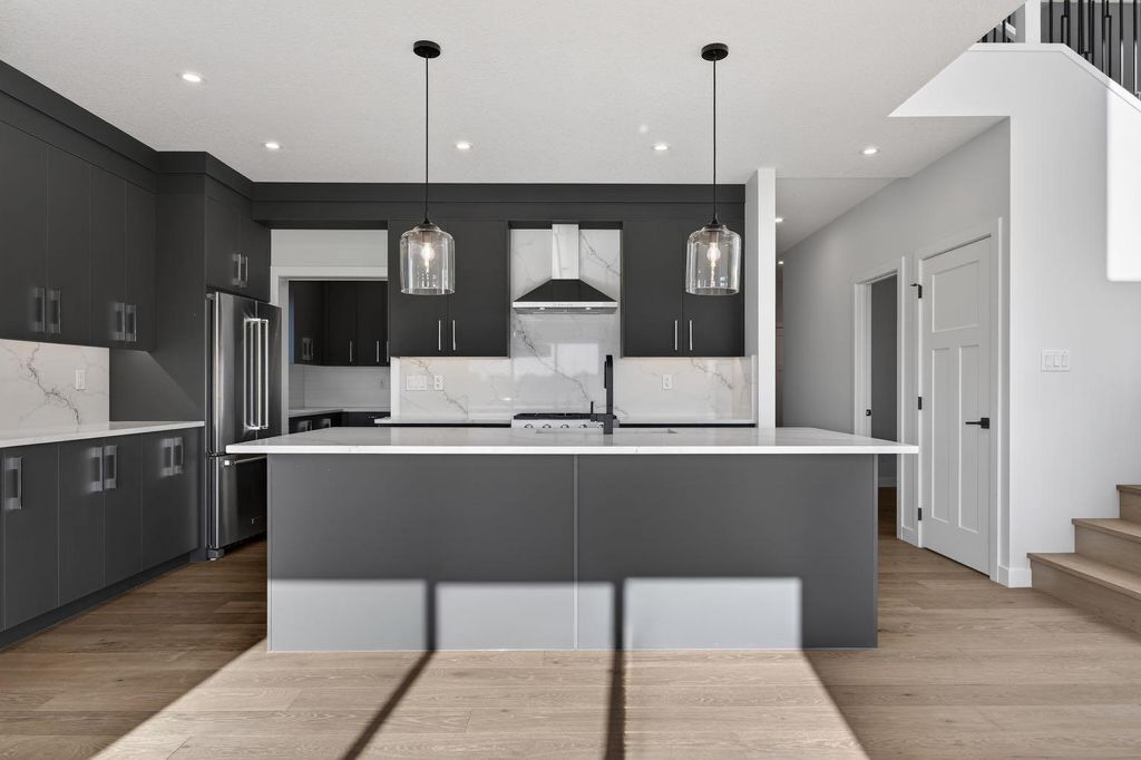 Photo of 709 Dawson Common, Chestermere, AB T1X 1Z7 (MLS # A2305430)