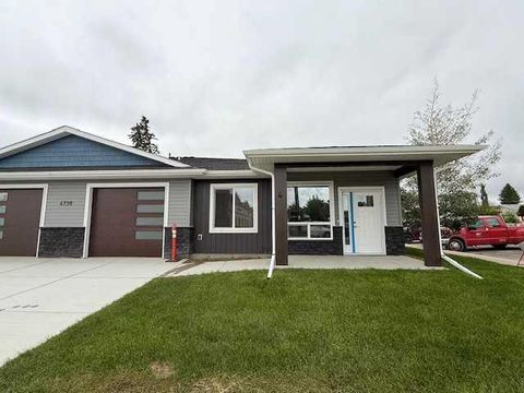Photo of 4738 49A Avenue #4, Lacombe, AB T4L 1N4 (MLS # A2320275)