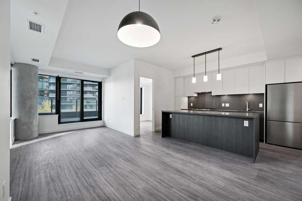 Photo of 730 2 Avenue SW #311, Calgary, AB T2P 1R8 (MLS # A2261023)
