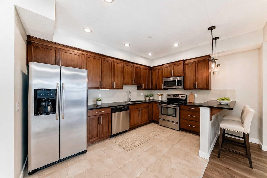 Photo of 1005A Westmount Drive #110, Strathmore, AB T1P 0C3 (MLS # A2320502)