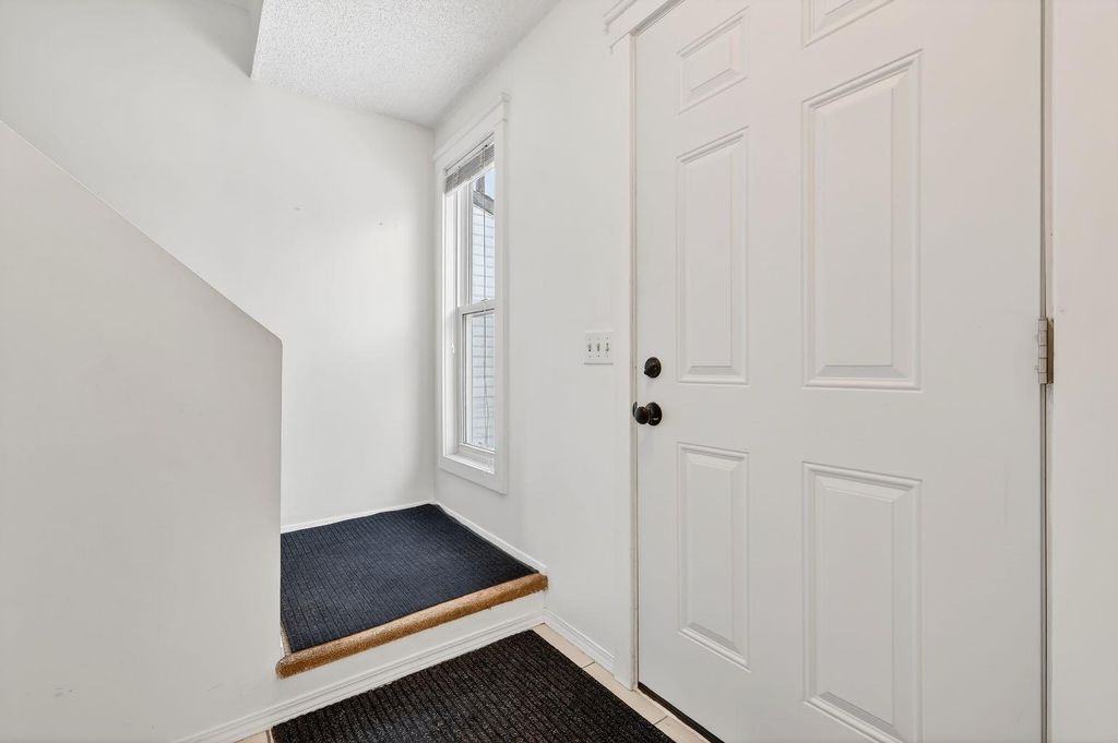 Photo of 115 Abingdon Court NE, Calgary, AB T2A 6S4 (MLS # A2286821)