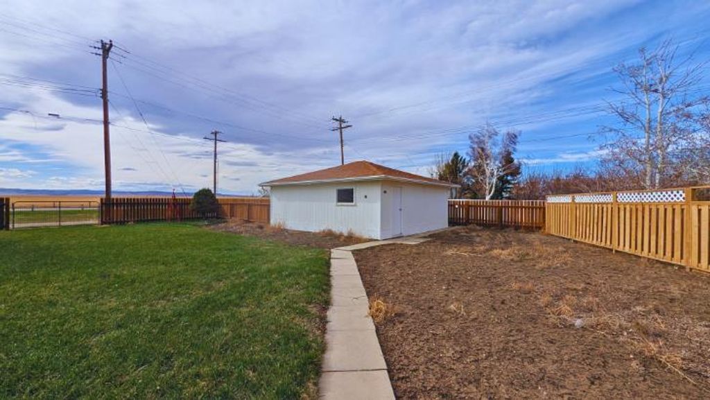 Photo of 752 54 Avenue W, Claresholm, AB T0L 0T0 (MLS # A2303853)