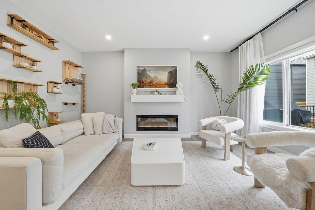 Photo of 902 Bluerock Way SW, Calgary, AB T2Y 0S5 (MLS # A2286798)