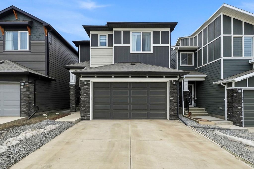Photo of 902 Bluerock Way SW, Calgary, AB T2Y 0S5 (MLS # A2286798)