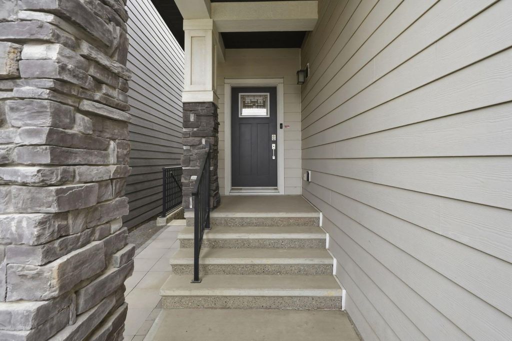 Photo of 902 Bluerock Way SW, Calgary, AB T2Y 0S5 (MLS # A2286798)