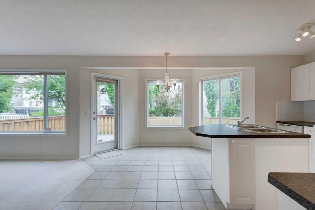 Photo of 111 Sierra Nevada Way SW, Calgary, AB T3H 3N1 (MLS # A2315899)