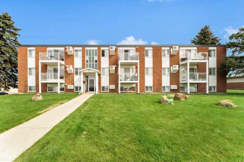 Photo of 512 McCutcheon Drive NW #7, Medicine Hat, AB T1A 6X7 (MLS # A2329936)