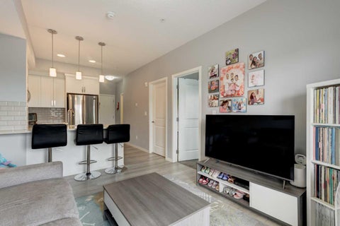 Photo of 370 Harvest Hills Common NE #307, Calgary, AB T3K 2M8 (MLS # A2328853)