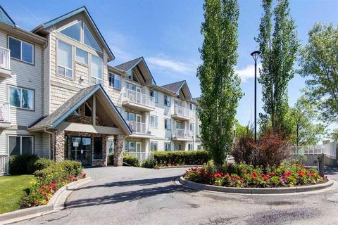 Photo of 7 Harvest Gold Manor NE #212, Calgary, AB T3K 4Y3 (MLS # A2322389)