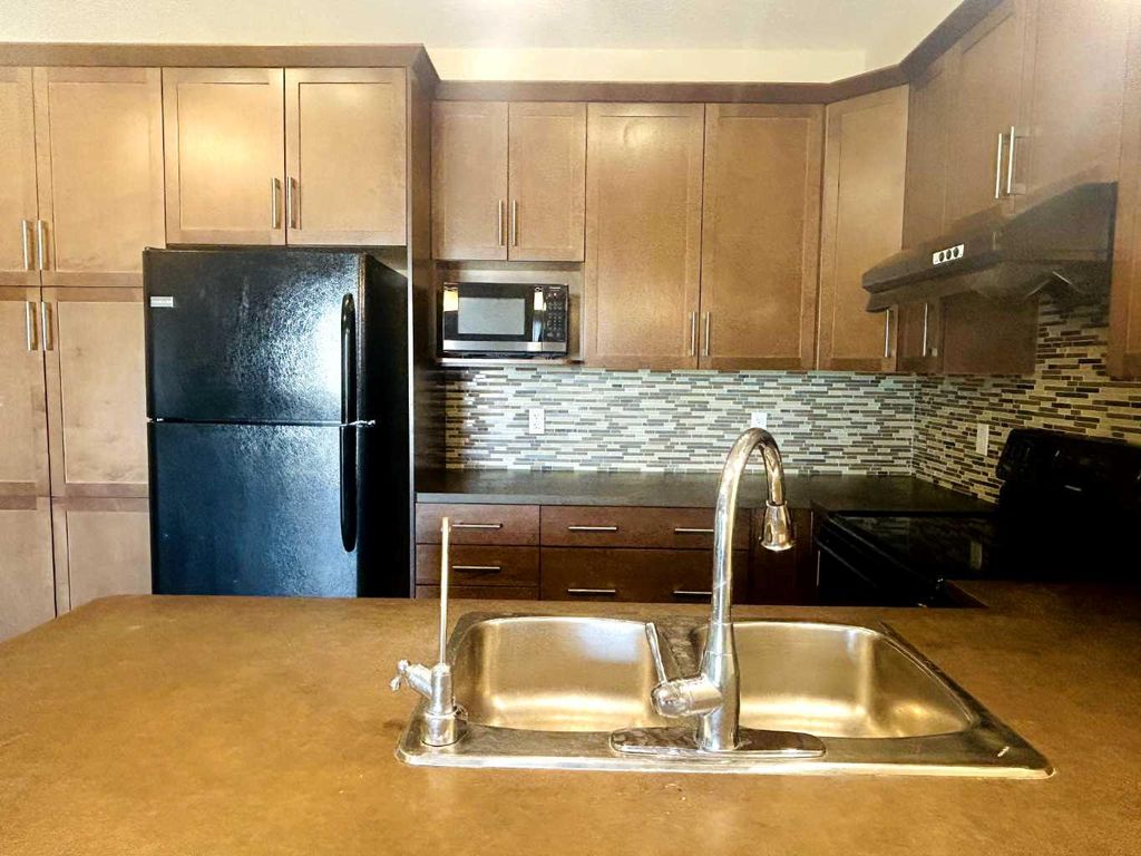 Photo of 175 Panatella Hill NW #2418, Calgary, AB T3K 0V9 (MLS # A2284775)