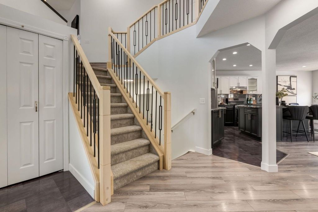 Photo of 82 Hidden Ridge View NW, Calgary, AB T3A 5V8 (MLS # A2300274)