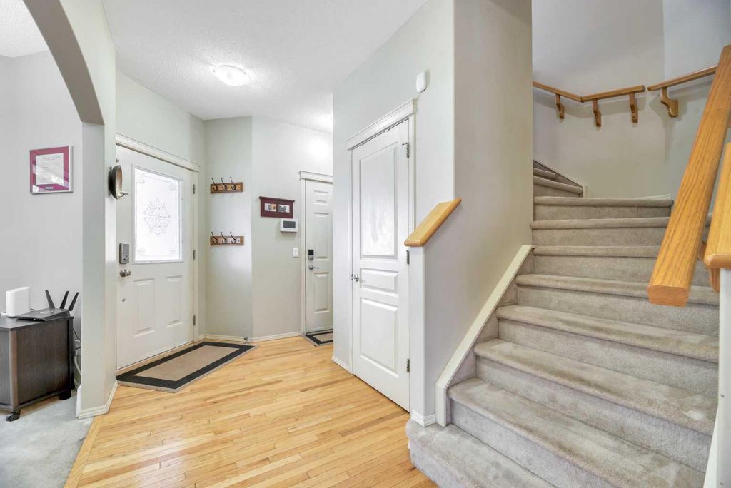 Photo of 408 Rainbow Falls Way, Chestermere, AB T1X 1S6 (MLS # A2269868)