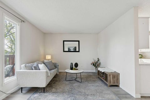 Photo of 1121 Berkley Drive NW, Calgary, AB T3K 1S6 (MLS # A2310886)