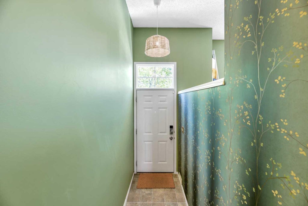 Photo of 101 Tuscany Springs Gardens NW, Calgary, AB T3L 2R4 (MLS # A2345189)