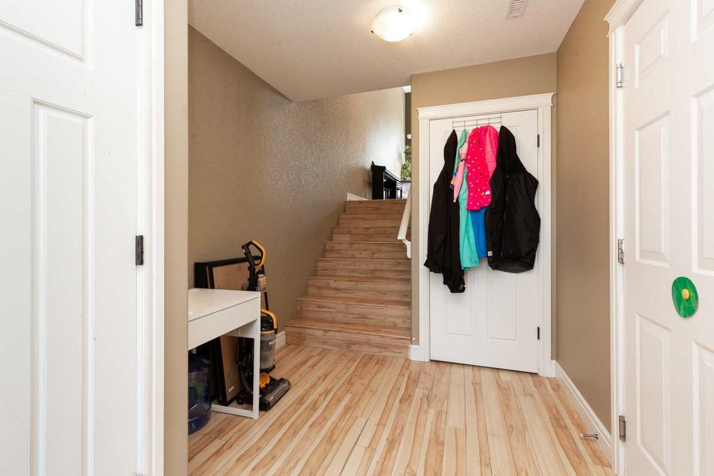 Photo of 879 Mt Sundance Manor W, Lethbridge, AB T1J 1X5 (MLS # A2324344)