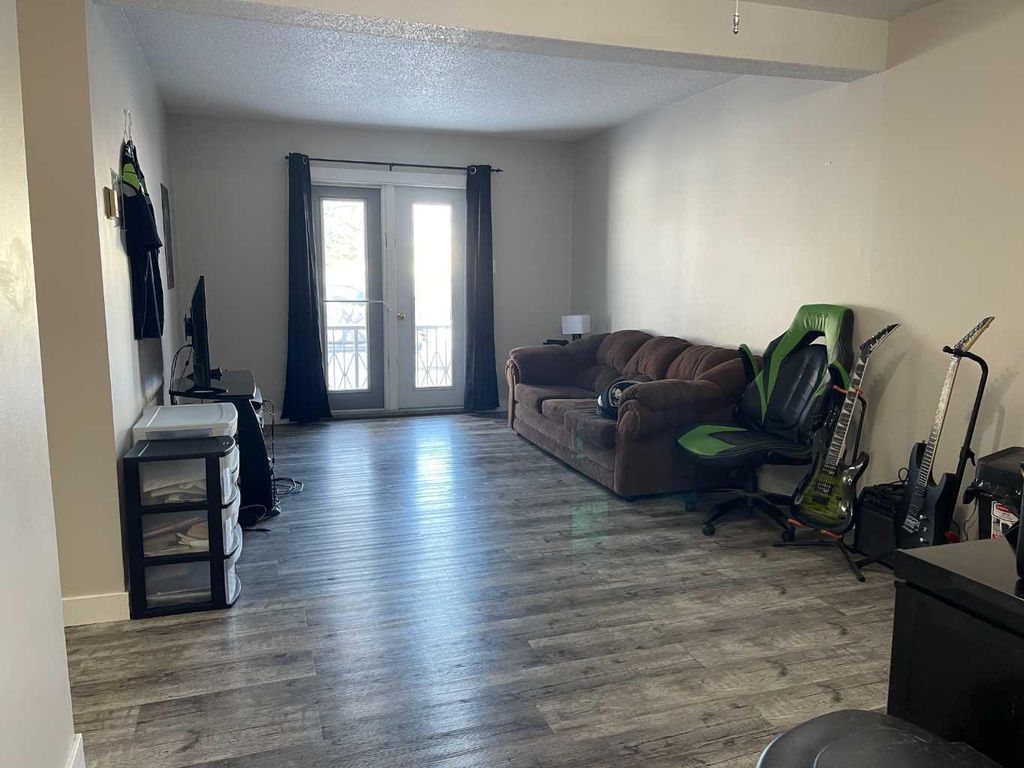 Photo of 3105 51 Avenue #1-8, Lloydminster, AB T9V 1H9 (MLS # A2300124)